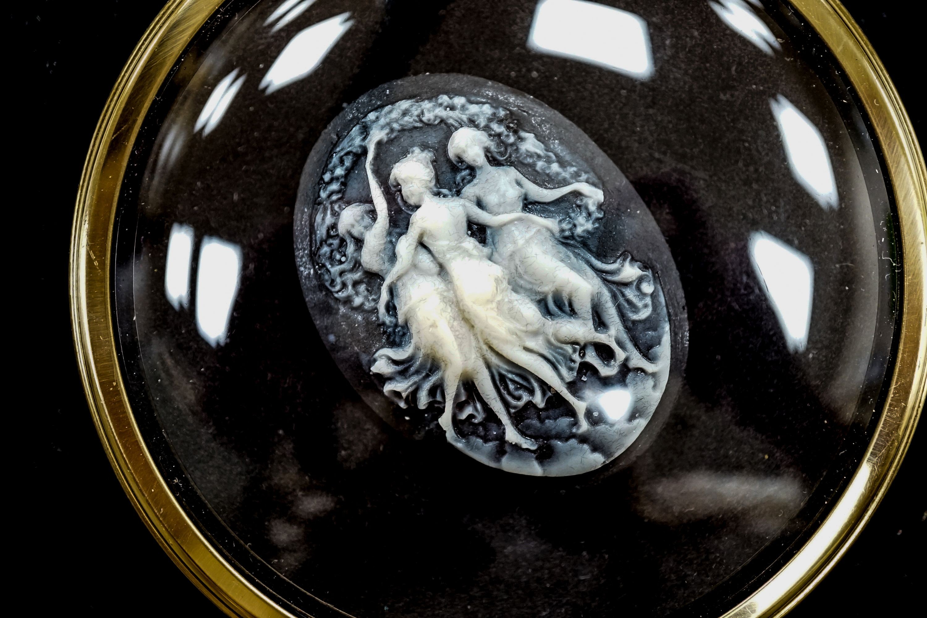A French biscuit porcelain cameo, in convex frame, frame 7cm